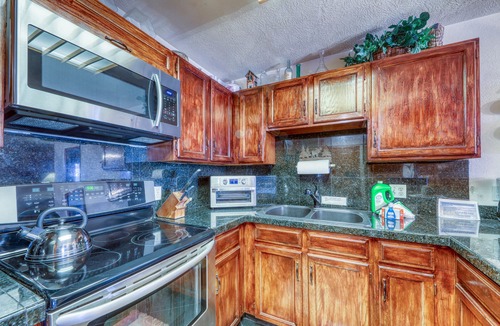 Historic District Condo | In-town condo with ideal walk-to-lifts location, pool, hot tubs & sauna
