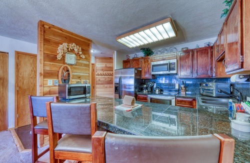 Historic District Condo | In-town condo with ideal walk-to-lifts location, pool, hot tubs & sauna