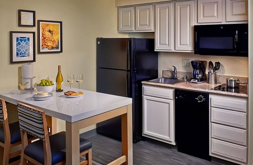 East Colorado Springs Apartment | Indulge in Home Like comfort! Pool, Full Kitchen, Near Pikes Peak Center!