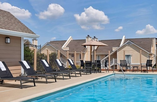 East Colorado Springs Apartment | Indulge in Home Like comfort! Pool, Full Kitchen, Near Pikes Peak Center!