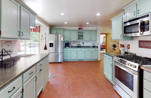 Palisade House | Inviting dog-friendly home with hot tub, full kitchen, grill, & W/D