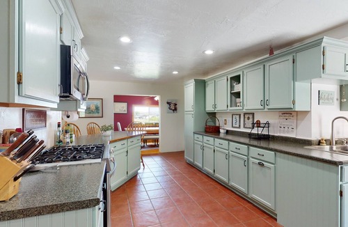 Palisade House | Inviting dog-friendly home with hot tub, full kitchen, grill, & W/D