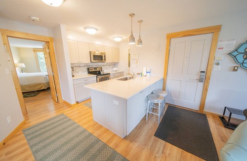 Lakeside Village Condo | Lake Views, Updated, King Bed, Pool & Hot Tub!
