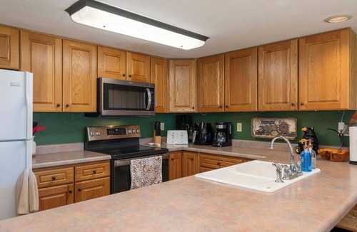 Grand Lake Condo | Lakefront Condo - Ground Floor - Fireplace + Two Patios - Ideal for Couples or Families