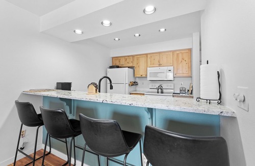 Lakeside Village Condo | Lakeside Village Condo w/Private Patio for Mountain Views & Shared Hot Tub!