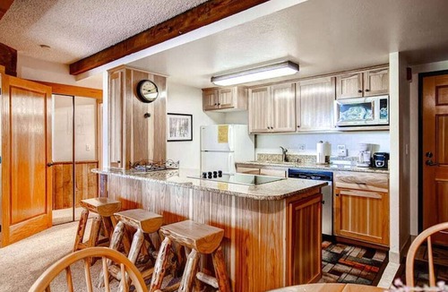 Peak 9 Condo | Lodge-Style Ski-In-Out Condo Perfect for Couples + Heated Pool & Hot Tubs
