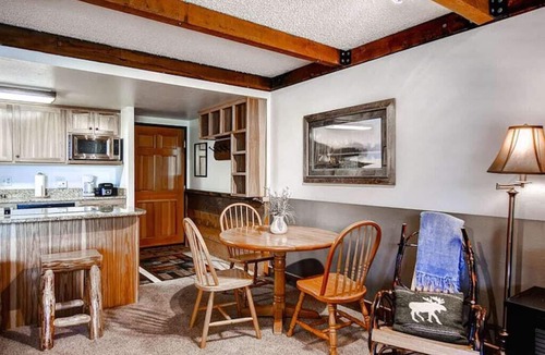 Peak 9 Condo | Lodge-Style Ski-In-Out Condo Perfect for Couples + Heated Pool & Hot Tubs