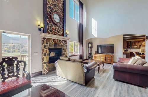 Gypsum House | Luxe home on Gypsum Creek Golf Course with fireplace and mountain views