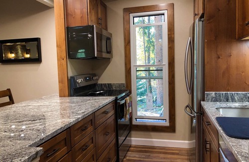 Frisco Condo | Luxurious, peaceful, family and dog friendly condo right on Ten Mile Creek!