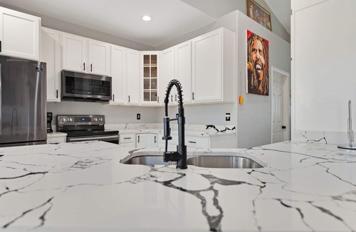 Montbello House | “Luxury 4BR Denver Retreat, Sleeps 10+, Entertainment & Prime Location”