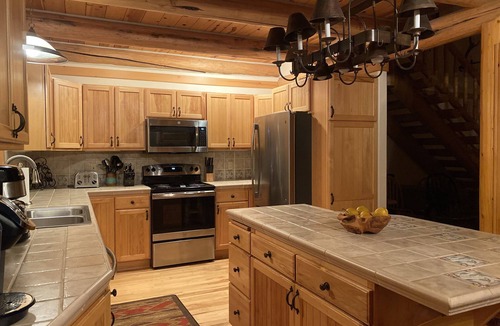 Pagosa Springs Cabin | Luxury Log Home with Hot Tub on 7+ Acres Featured In Log Home Digest. Sleeps 10