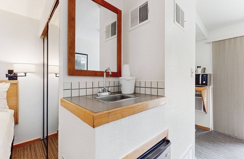 West End Cabin | Main St. room - pool & hot tub - walk to lifts, dog-friendly, balcony