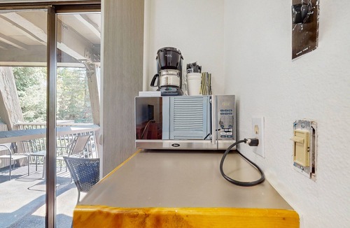West End Apartment | Main Street room - hot tub & pool - walk to lifts, dog-friendly, balcony