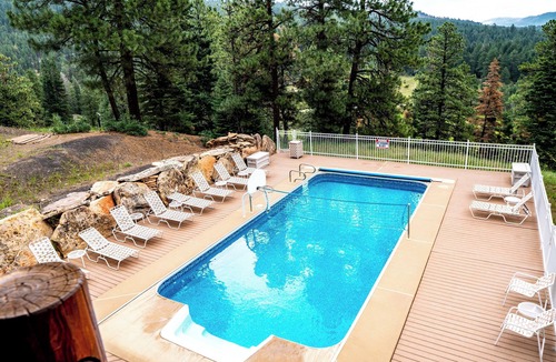 Purgatory House | Majestic Manor with Private Pool, Theater Room, Large outdoor wedding altar