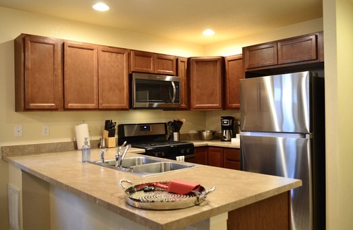 Centerra House | Modern 2 Bedroom Townhome, 1.5 Bathrooms, 1 Car Garage with Level 2 EV Charging