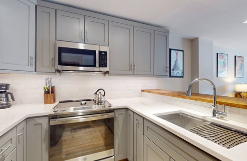 Avon Condo | Modern condo steps to gondola & lake w/view & patio - in heart of everything