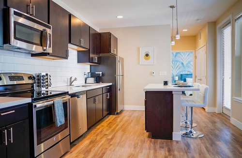 Highland Apartment | Modern Luxury Apt in Downtown Denver + King Bed + Private Garage + Pool