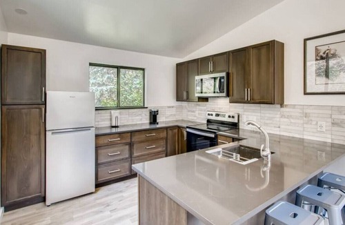 Idaho Springs Condo | Modern Work & Play WATERFRONT Condo right on the creek