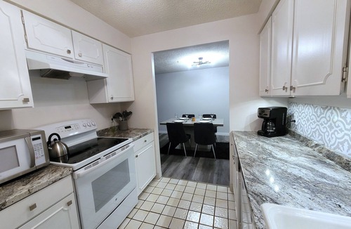 Southeast Colorado Springs Condo | Mountain Views! 2 bdrm, full home, 10th floor- 48ft balcony Pike's Peak sunsets!