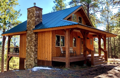Pagosa Springs House | Nestled-in-pines, sooth-your-soul custom home with an incredible mountain view.