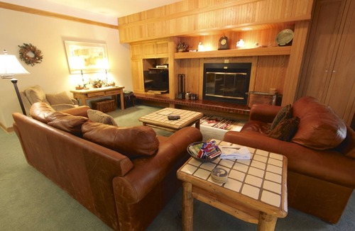 Mountain House Condo | New Private Hot Tub! Walk to Lifts, Log-Burning Fireplace, Warm and Cozy
