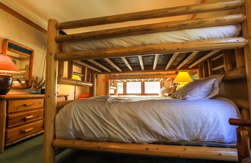 Mountain House Condo | New Private Hot Tub! Walk to Lifts, Log-Burning Fireplace, Warm and Cozy