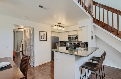 Meadow Hills Condo | New! Urban Oasis - Pool Access - Fireplace - 30 Day Rental