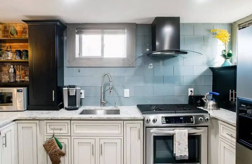 Cheesman Park Apartment | Newly remodeled garden-level suite near downtown in Cheesman Park neighborhood.