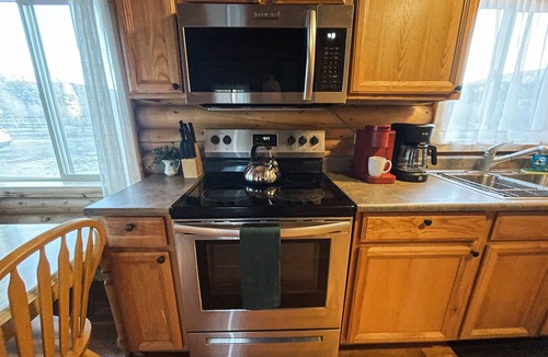 South Fork Cabin | On the river! Private patio. 2 large yards. Dog friendly. Book now for summer!