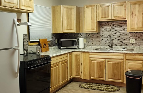 Crystal Lake Cabin | Our Property offers a relaxing getaway with a hot tub and massage chair!