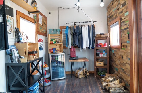 Meeker House | Our tiniest Tiny Home packs a punch! It contains a Queen bed in a loft accessed by a ladder. Sleeps: 2
