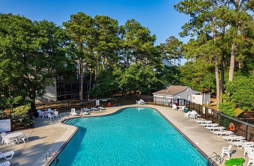 Colington Condo | Oyster Pointe E3: Soundfront | Shared Pool, Tennis