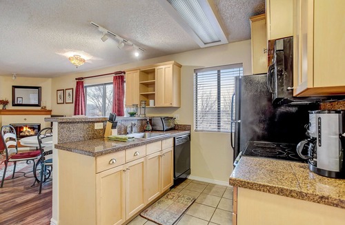 Englewood Condo | Partial view of Rocky Mountains from balcony!