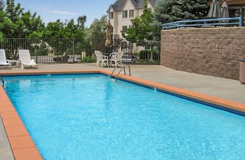 Englewood Condo | Partial view of Rocky Mountains from balcony!