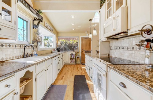 East Colorado Springs House | Peach House | Adventure Haven | Dog Friendly/BBQ