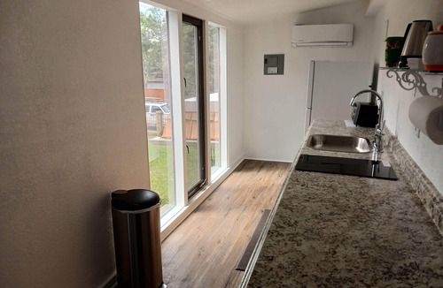 Greenwood Village House | Private entrance master suite with a kitchenette