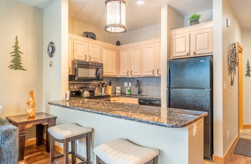 Lakeside Village Condo | Private Patio w/Lake and Mountain Views, Shared Pool, Sauna & Hot Tub!