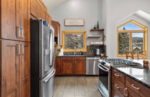 Three Peaks House | Private Wooded Setting with Open-Concept Layout and Updated Kitchen