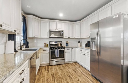 Arvada Plaza Area House | Projector Nights & Park Delights I Designer Reno