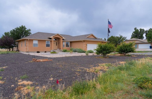 Pueblo West House | Pueblo West House with comforts of home and more!