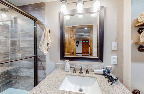 Rye Cabin | Remodeled wilderness retreat with game room, fireplaces, & deck