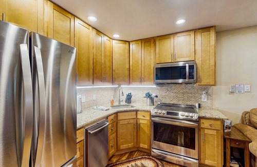 Winter Park Condo | Renovated water-view retreat with hot tub & heated pool