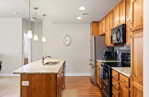 Rigden Farm Condo | Rigden Farm Loft with garage, elevator, secure building, close to CSU & Old Town