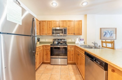 River Run Condo | River Run Condo with Spacial Balcony overlooking Ice Rink & Mountain Views!