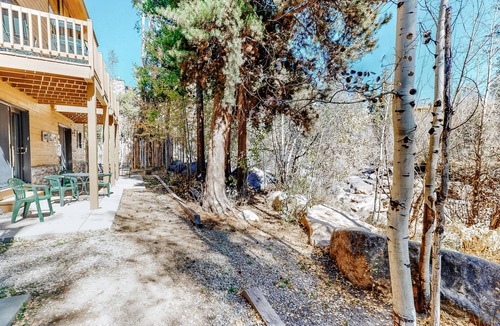 Grand Lake Condo | Riverfront condo with free wifi, fireplace, patio, & gas grill
