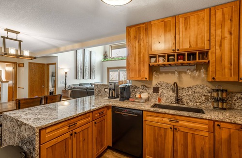 Mountain House Condo | Ski-in/ski-out home with pool, hot tub, sauna, washer/dryer, & private balcony