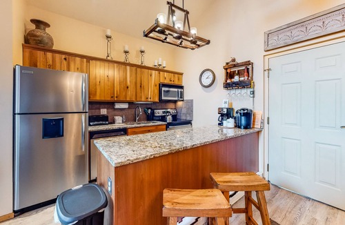 Four O'Clock Condo | Ski-in/ski-out retreat with wraparound decks, hot tubs, ski views