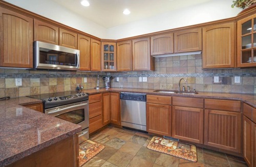 Stanley Hills Condo | Spacious condo with two living rooms, large balcony, and views of RMNP!