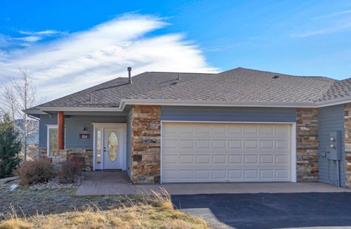 Stanley Hills Condo | Spacious condo with two living rooms, large balcony, and views of RMNP!