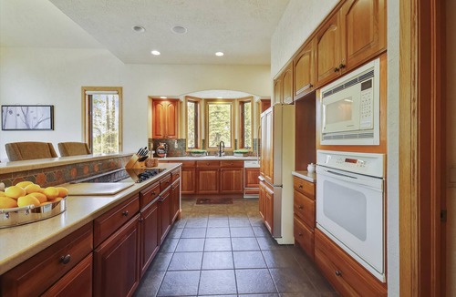 The Highlands House | Stay at Evergreen Lodge, a secluded home with a private hot tub and private ski shuttle.